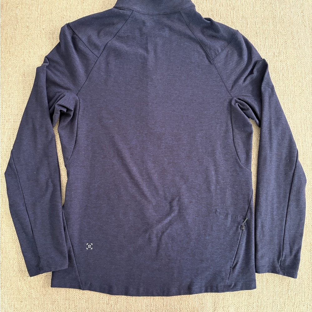 Mens Lululemon Surge Warm Half-Zip lightweight pullover. The tag is missing.